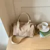 Bolso bandolera nuevo para mujer 2026, bolso de mano liso y elegante, de alta calidad y a la moda, con un diseño de bolso de hombro relajado y chic