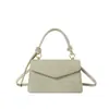 Bolso de diseño de nicho nuevo 2026, bolso cruzado moderno y texturizado, bolso versátil para mujer retro y simple, moderno
