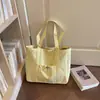Bolso de hombro tipo tote de moda con lunares pequeños de gran capacidad, nuevo de verano 2026, simple y versátil