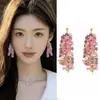 Nuevos Pendientes Chinos de Flor Rosa con Borlas Exagerados Clavos de Oreja Lujo Ligero de Gama Alta Atmosféricos Colgantes de Oreja Pendientes de Novia para Mujer