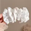 Acessórios de cabelo elegantes e sofisticados: grampos de cabelo para dar volume, presilhas de garra, presilhas verticais, presilhas de laço, presilhas banana, presilhas torcidas doces e estilosas