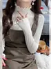 Suéter de punto para mujer de otoño e invierno, ajuste ceñido, agradable para la piel, suave y cómodo, de manga larga, con cuello semi-alto y ribete de volantes.