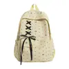 Mochila de bolinhas de alta qualidade para meninas, adequada para alunas do ensino fundamental II, com laço, grande capacidade e um design moderno e minimalista para uso escolar.