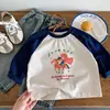 Camiseta de manga larga raglán de algodón puro estilo coreano para niños, nuevo modelo otoño 2026, camiseta básica para niños para primavera y otoño