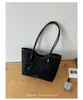Bolso de axila de alta gama transfronterizo para mujer, nuevo modelo 2026, bolso de hombro de nicho de lujo ligero, bolso tote de gran capacidad