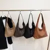 Bolso de hombro de gran capacidad de comercio exterior nuevo 2026, popular en Europa y América, bolso tote vintage, versátil para ir al trabajo, bolso suave de cuero para madre e hijo