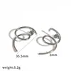 Pendientes minimalistas irregulares en espiral de acero inoxidable europeos y americanos transfronterizos, chapados en oro real de 18 quilates, pendientes de acero de titanio personalizados de nicho