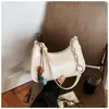 Bolso de comercio exterior transfronterizo de la fábrica de origen, bolso pequeño cuadrado de un solo hombro de color sólido para llevar debajo del brazo con estampado de piedra, bolso de moda para mujer