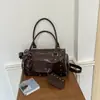 2026 Nova Bolsa de Ombro Único Transversal Retro Super Quente Feminina de Alto Padrão Nicho para o Dia a Dia Bolsa Almofada