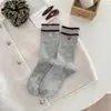 Calcetines Ankora rojos de media pantorrilla para mujer, otoño e invierno, estilo japonés, versátiles, con detalles de lazo y encaje, calcetines de algodón, estilo retro preppy, calcetines con volantes