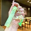 Llavero Creativo Serie Océano con Arena Movediza Rellena de Aceite, Lentejuelas y Colgante de Pez Flotante, Adorno de Pez Hada, Pequeño Regalo