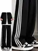 Pantalones deportivos de mujer a rayas negras 2026 nuevo otoño de cintura alta casual para figuras petite, pantalones anchos sueltos y fluidos