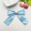 Novo Laço de Fita de Poliéster com Pérola em Forma de Coração Adorno de Cabeça Joia DIY Flor para Sapato Capa de Celular Acessórios para Mala Roupas