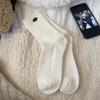 Calcetines de Mujer Corea del Sur Ins Color Sólido Ámbar Botón Huevo Cálido Grueso Apilados Calcetines de Mujer de Media Caña con Pantalones de Tiburón