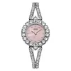 O relógio feminino redondo de quartzo mais vendido da Gedi com pulseira cravejada de diamantes, à prova d'água, estiloso e versátil, relógio de pulso feminino de nicho para o dia a dia.