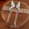 Pendientes Largos Estilo Coreano con Borla de Mariposa Incrustada de Circonita, Elegantes y con Estilo, Pendientes de Lujo Ligero y de Gama Alta al por Mayor