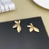 Pendientes Irregulares de Moda Transfronterizos Europeos y Americanos de Media Flor con un Diseño Único y Temperamento Elegante para Mujer
