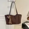 Bolso casual de gran capacidad para debajo del brazo para mujer, nuevo bolso de hombro vintage esmerilado 2026, bolso tote versátil de nicho para el día a día
