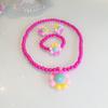 Joyería transfronteriza para niños de primaria, collar de perlas, pulsera de flor de girasol, anillo, clip para la oreja, juego de cuatro piezas al por mayor