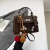 Bolsa de Camurça Coreana de Nicho Outono e Inverno para Mulheres 2025 Nova Versátil Retrô Bolsa Transversal Bolsa Kelly Retrô