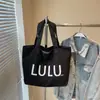 Bolso de Lona Retro Coreano Bolso Tote para Mujer 2026 Nuevo Gran Capacidad Letra Bolso de Hombro Bolso de Viaje para Estudiantes Universitarios