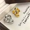 Anillo de Metal Asimétrico de Moda Estilo Europeo y Americano para Mujer, Simple y Elegante Diseño de Anillo para Dedo Índice Transfronterizo Anillo de Nicho
