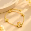 Nova pulseira de trevo cravejada com diamantes em estilo chinês para mulheres, uma peça luxuosa e elegante adequada para o uso diário, com design floral e banho de ouro, perfeita como presente, atacado disponível