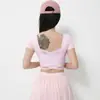 Novo Conjunto de Yoga Feminino com Bojos, Costas Cruzadas em Renda Bonitas, Manga Curta, Cintura Alta, Emagrecedor, Esportivo, Conjunto de Saia Plissada