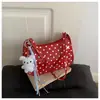 Bolso de mujer de moda 2026 estilo nuevo, de lunares moderno, bolso de mano fresco para el antebrazo, lindo bolso de hombro diario para estudiantes para salir