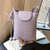Moda transfronteriza exquisita de alta gama 2026 nuevo bolso de teléfono simple para mujer de diseño nicho primavera-verano, para llevar al hombro y cruzado