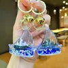 Chaveiro Vela Azul Série Oceano Infundido com Óleo Pingente Criativo de Areia Líquida Acrílica Acessório para Alça de Bolsa Presente