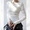 Moda europea más vendida de lujo ligero de alta gama, camiseta blanca de cuello redondo y manga larga, única y hermosa, impresionante para mujeres en otoño