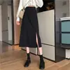 Saia midi feminina, nova coleção de primavera 2026, com um elegante design francês, cintura alta, fenda e uma silhueta evasê preta que acentua os quadris
