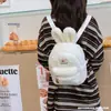 Mochila pequeña de felpa con orejas de conejo para mujer 2026 Nuevo estilo Mochila mini para niños Bolsa linda de corazón femenino