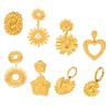 Europa y Estados Unidos venta caliente transfronteriza talla anillo aretes de flor hueca acero titanio chapado oro 18K aretes exagerados joyería mujer