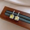 Pendientes geométricos de flores de circonita verde transfronterizas europeas y americanas, elegantes pendientes que combinan con todo, ligeros pendientes de lujo de alta gama, sentido del diseño