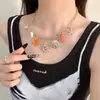 Collar de metal esmaltado con diseño de estrella de mar, concha y flor, transfronterizo europeo y americano, cadena dulce vintage para la clavícula, joyería premium