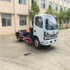 Camión de Basura de Brazo de Gancho Vi Dongfeng Dolica de 5 Metros Cúbicos Placa Azul Camión de Basura para Construcción Urbana Se Puede Equipar con Múltiples Contenedores en Un Camión