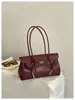 Bolso de mano de lujo estilo francés para mujer, nuevo diseño retro, sensación de alta gama, maletín de axila, bolso de hombro versátil para ir al trabajo