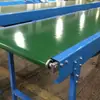 Línea de conveyor de línea de cinta pequeña para empaque de alimentos, venta directa de fábrica Shandong Zhuoyuan. Bienvenido a hacer su pedido.