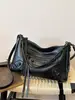 Nueva bolsa de hombro tipo tote para comercio exterior transfronterizo, estilo motociclista con remaches, gran capacidad, bolsa grande negra 2026