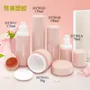 Fábrica de Elogios Venta al por Mayor Rosa Juego de Botellas Cosméticas Botella Plástico PET Botella de Loción 50g Botella de Crema
