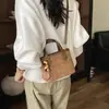 Nova Moda para Escritório e Dia a Dia Design de Nicho Retro Relaxado Bolsa Saco para Mulheres Moda Outono 2026 Bolsa de Mão Transversal