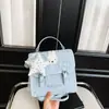 Mochila Escolar de Ombro Único de Grande Capacidade Fresca 2026 Pingente Nova Moda Casual Estilo Coreano Estudante Doce Mochila de Ombro Duplo para Mulheres