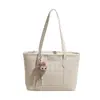 2025 Nova Bolsa de Ombro Super Popular, Moderna e Versátil, Design de Nicho de Alta Qualidade, Bolsa Tote Casual Simples de Grande Capacidade
