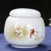 Bote de té de cerámica, frasco pequeño sellado para almacenar flor de ciruelo, orquídea, bambú, crisantemo, Tieguanyin, té perfumado y polvo de té, caja de embalaje para té