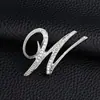 Temperamento de comercio exterior europeo y americano 26 broches de letras inglesas femenina diamante personalidad Joker moda corsage pin masculino accesorios