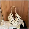 Bolso de axila de nicho de alta gama para mujer, bolso tipo cubo con estampado de lunares nuevo 2026, bolso de hombro de gran capacidad