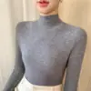 Suéter tejido sin costuras de una sola línea, suave y amigable con la piel, suéter ajustado de cuello medio alto para mujer, adecuado para otoño e invierno, se puede usar como capa base debajo de un abrigo, venta al por mayor
