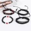Venta caliente Europa y Estados Unidos nuevo traje de pulsera de cuero de cuatro piezas AMOR pulsera tejida para hombre joyería al por mayor